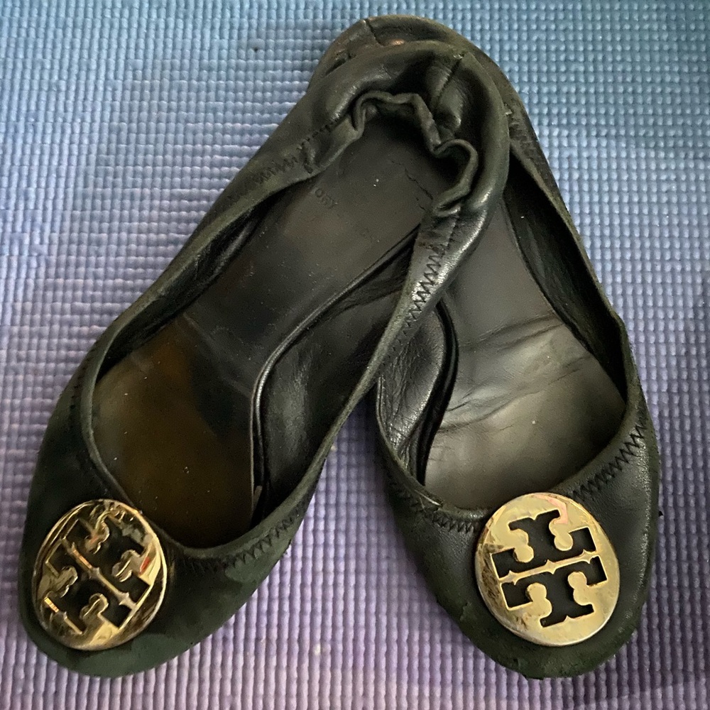 Very worn out black Tory Burch Minnie Ballet flats
